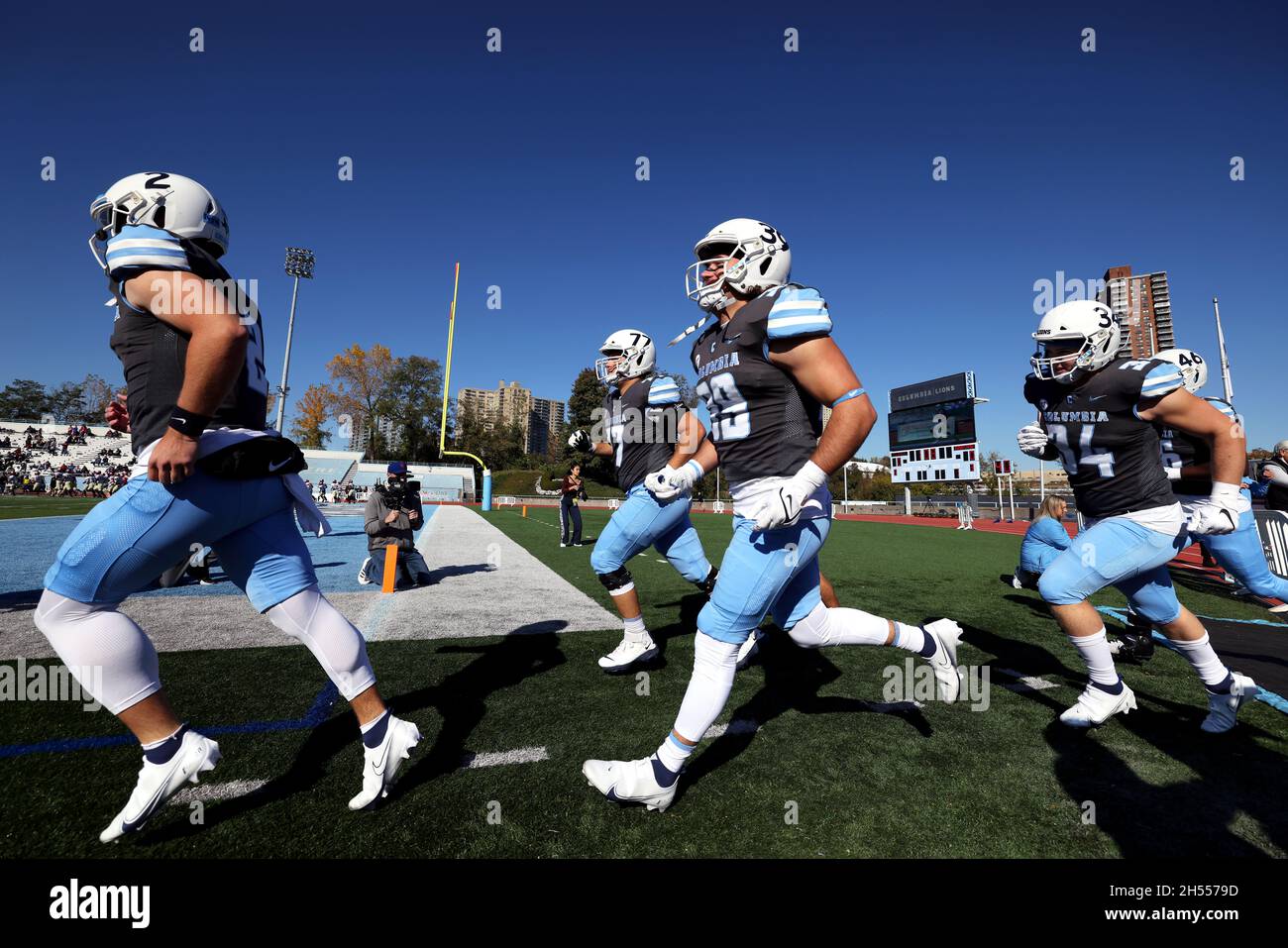 New York City, New York, United States. 6th Nov, 2021. Members of the Columbia Lions football team take to the field at Wien Stadium in New York at the start of their game today against the Harvard Crimson. Harvard won the game 49-21. Credit: Adam Stoltman/Alamy Live News Stock Photo