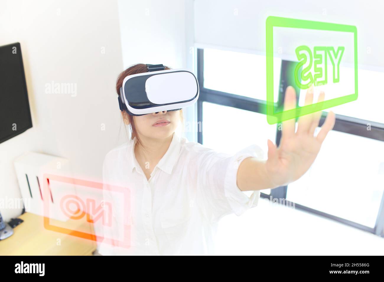 girl using the virtual reality glasses Stock Photo