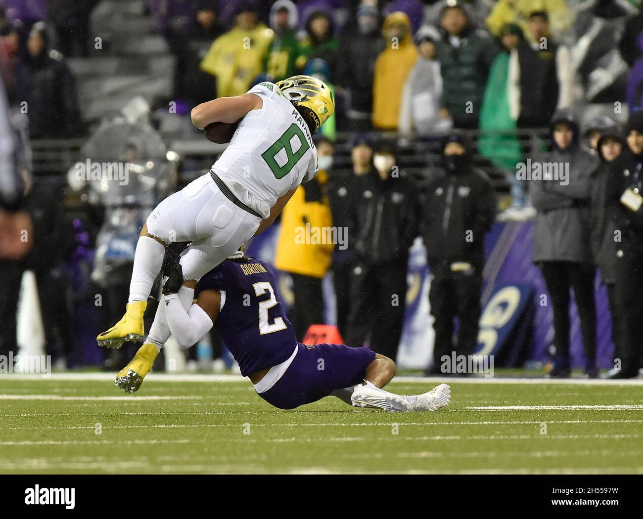 Seattle, WA, USA. 06th Nov, 2021. Washington DB Kyler Gordon upends Oregon TE Moliki Matavao during the NCAA football game between the Oregon Ducks and Washington Huskies at Husky Stadium in Seattle, WA. Oregon defeated Washington 26-16. Steve Faber/CSM/Alamy Live News Stock Photo