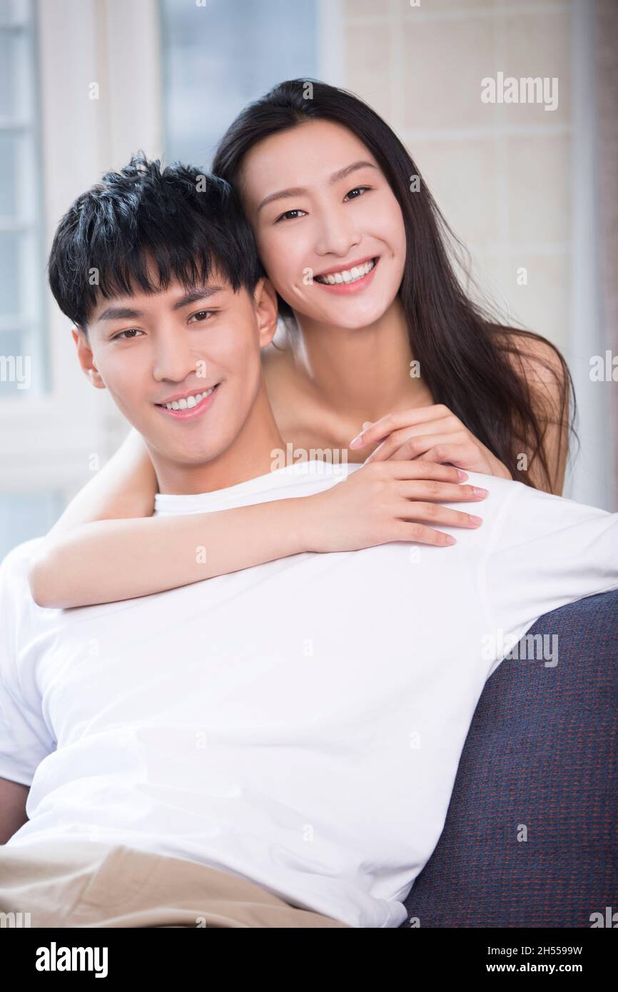 Happy and loving young couple Stock Photo - Alamy
