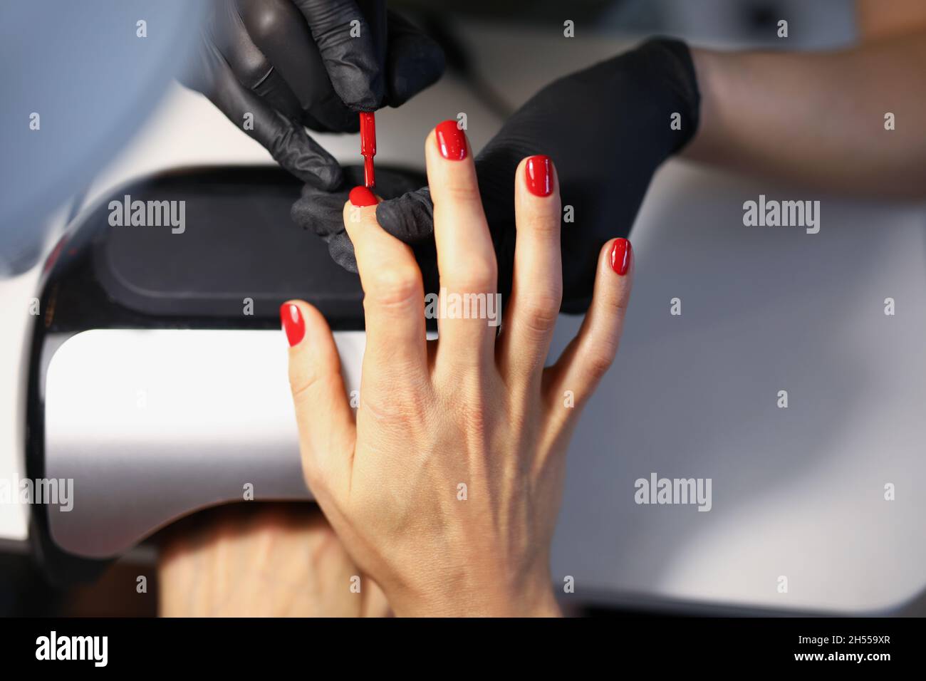 Manicurist female work in beauty industry Stock Photo