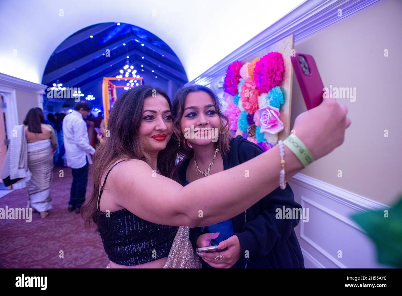 Monica Sharma (left) and Simar Sharma, 15, of Warrington make a selfie