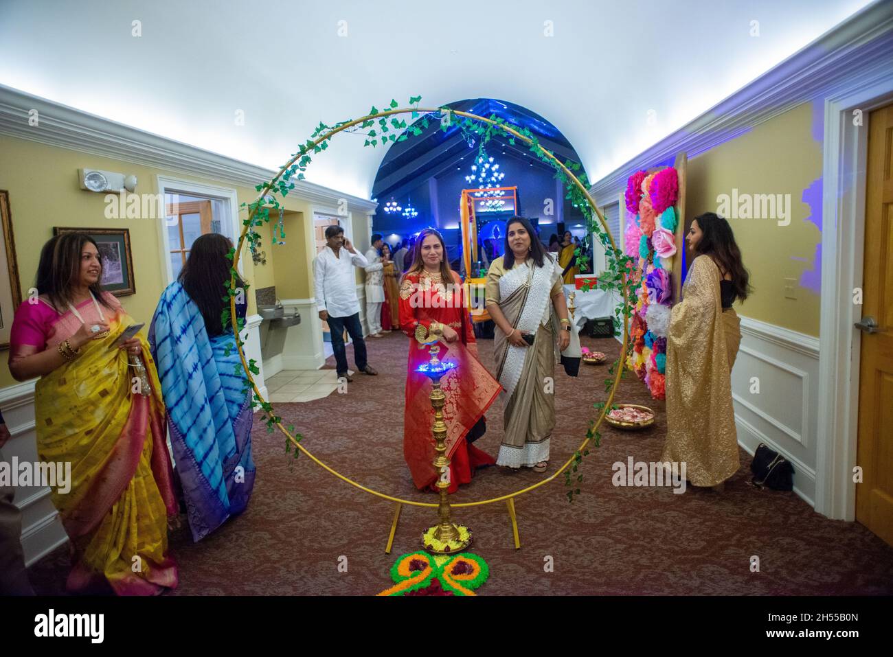 Jamison, United States. 06th Nov, 2021. A group of women gather near