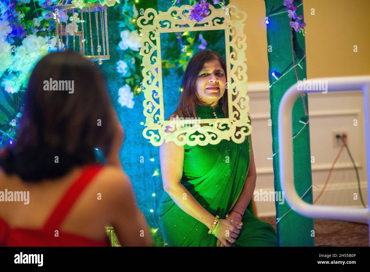 Bosky Parikh of Lawrenceville, NJ is photographed though a frame during