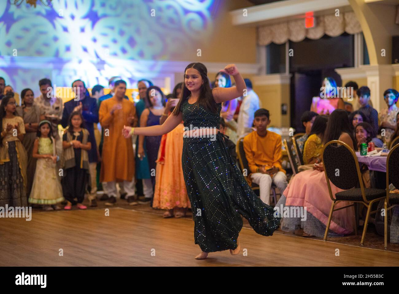 Jamison, United States. 06th Nov, 2021. A girl named Mega performs a