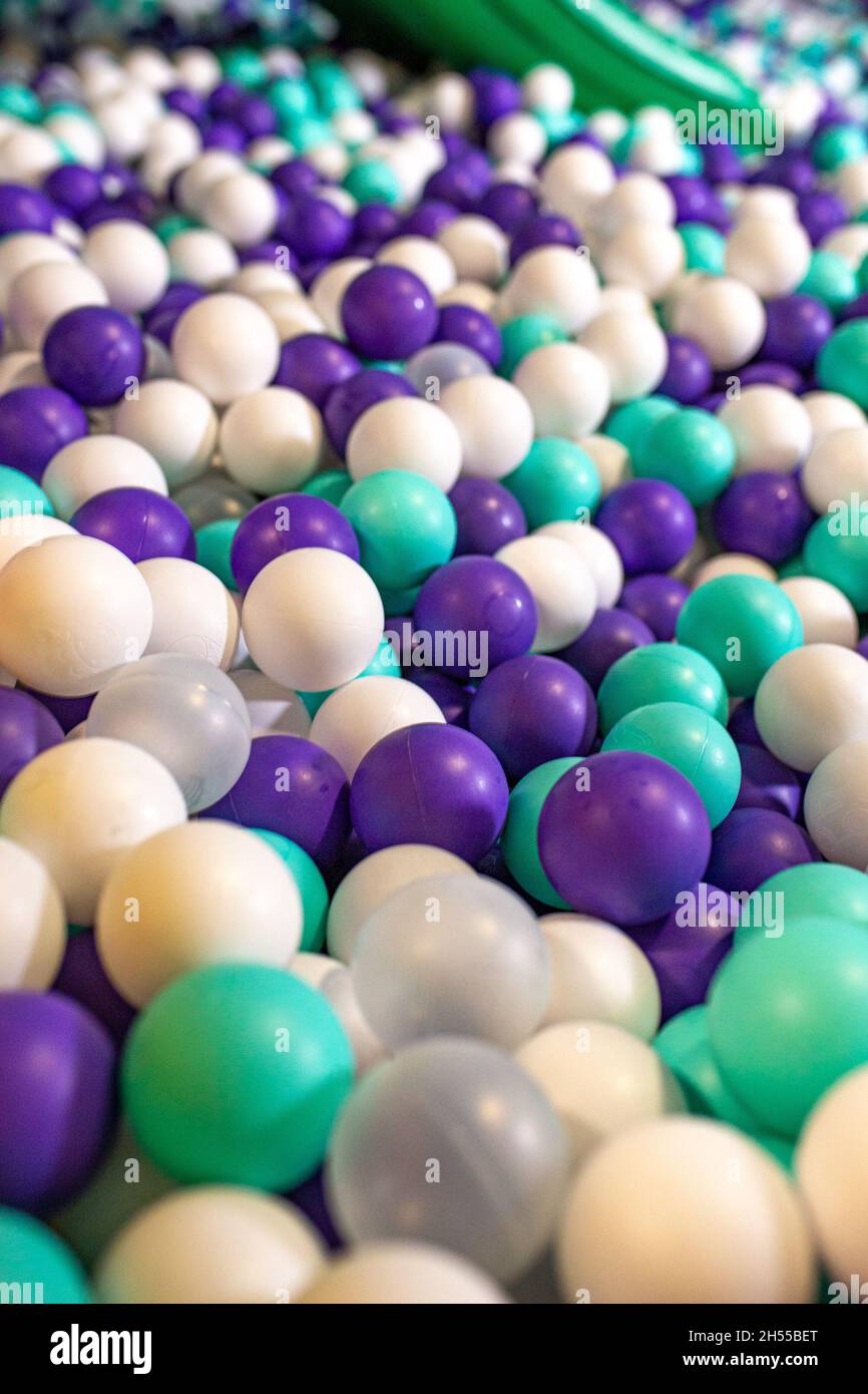 many small multicolored plastic balls in the pool desk Stock Photo Alamy
