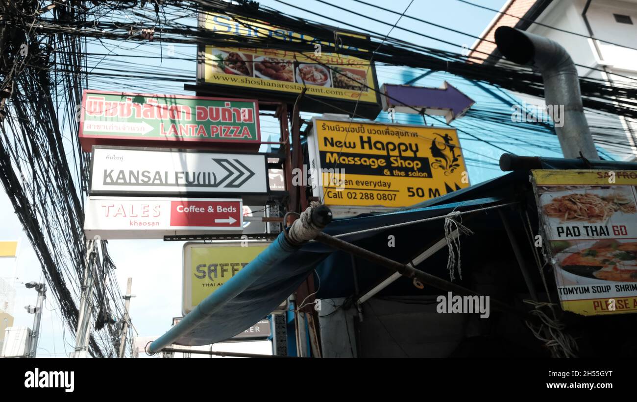 Signs and Billboards Khaosan Road aka Khao San Road Area Tourist Attraction Bangkok Thailand Stock Photo