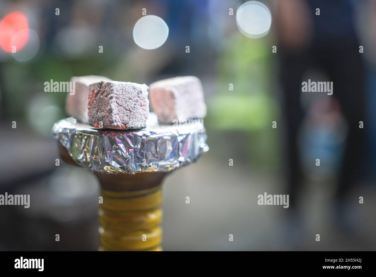 Closeup View of an Arabian Hookah Head with Glowing Coal on it Stock