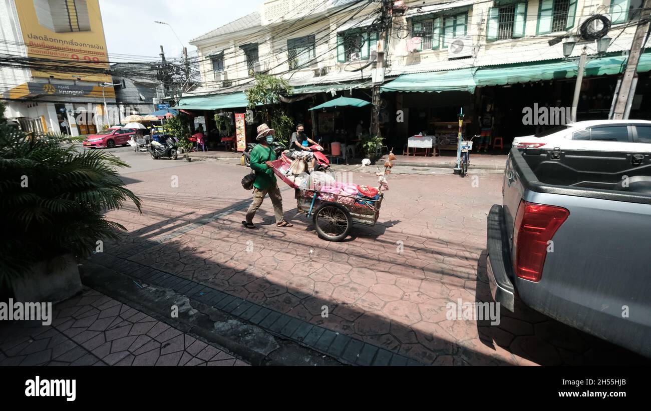 Street Vendor with Push Cart Khaosan Road aka Khao San Road Area Tourist Attraction Bangkok Thailand Stock Photo