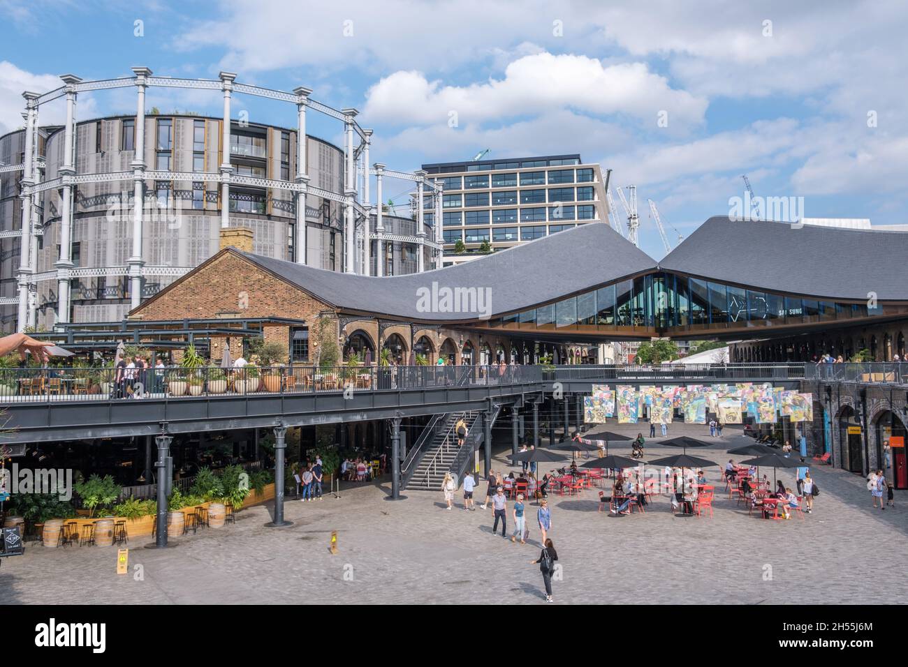 Coal Drops Yard, with the kissing roofs and gasholder apartments, is a vibrant, modern shopping
