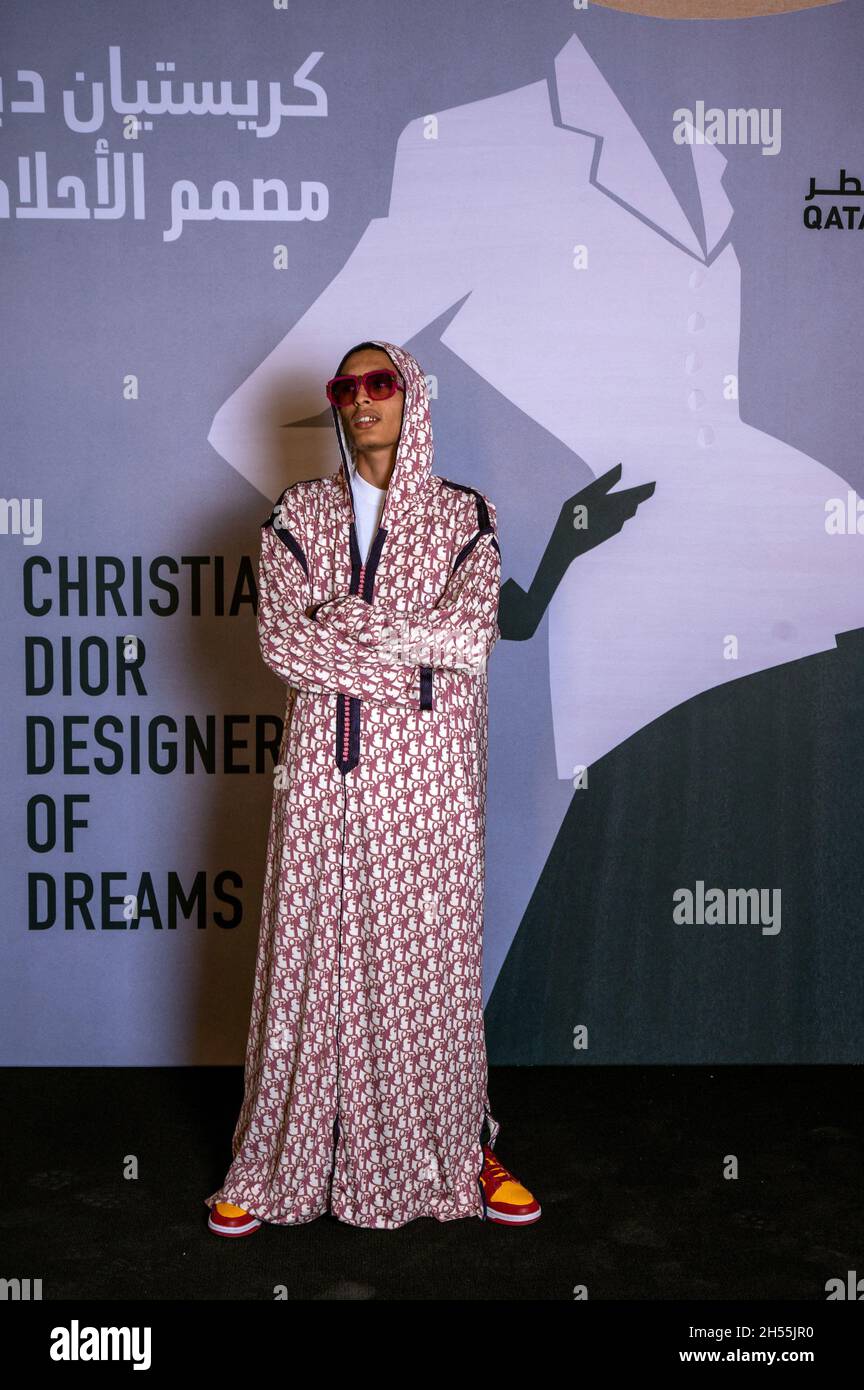 Tariq Hajjaj (son of Moroccan artist Hassan Hajjaj) arrives to Dior  Designer of Dreams exhibition, at M7 center, in Doha, Qatar, on November 5,  2021. Photo by Balkis Press/ABACAPRESS.COM Stock Photo -