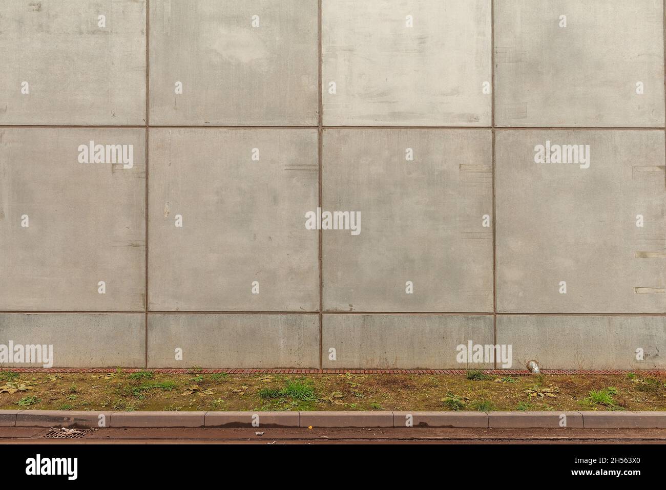 Gray concrete wall with lots of concrete shapes and grid lines Stock Photo
