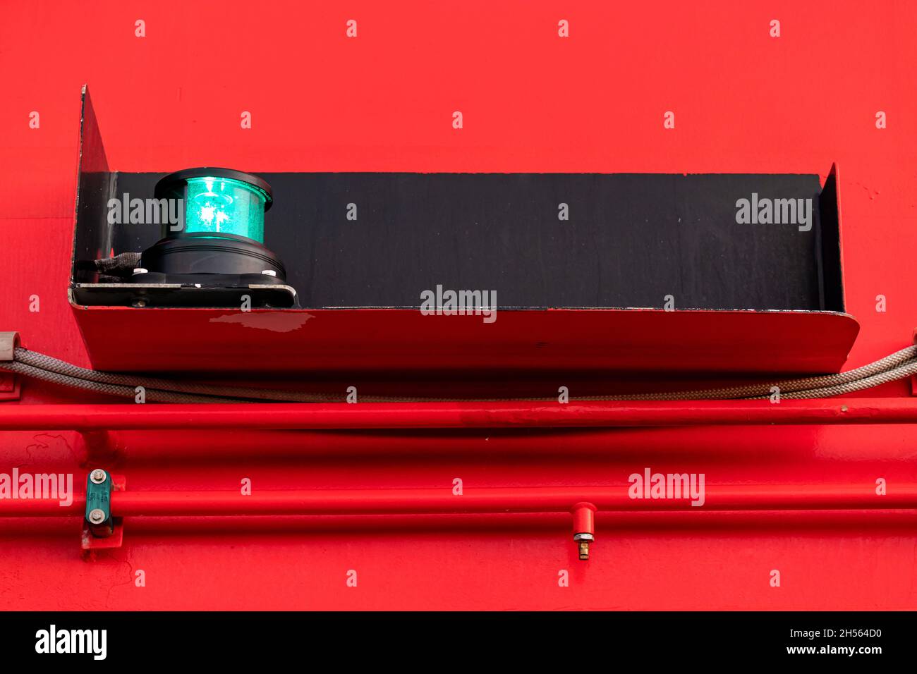 green starboard navigation light aboard a ship Stock Photo Alamy