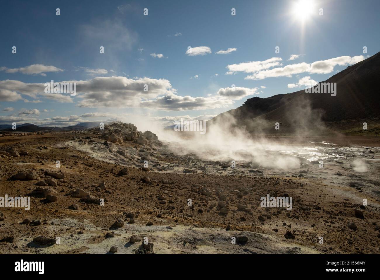 Geothermal area bubbling pools of mud steaming sulfuric gas Stock Photo