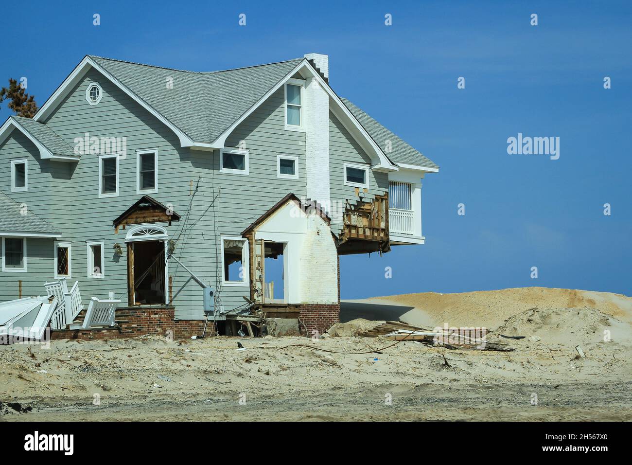 House destroyed by tornado with part of ground floor ripped off Wooden building wrecked