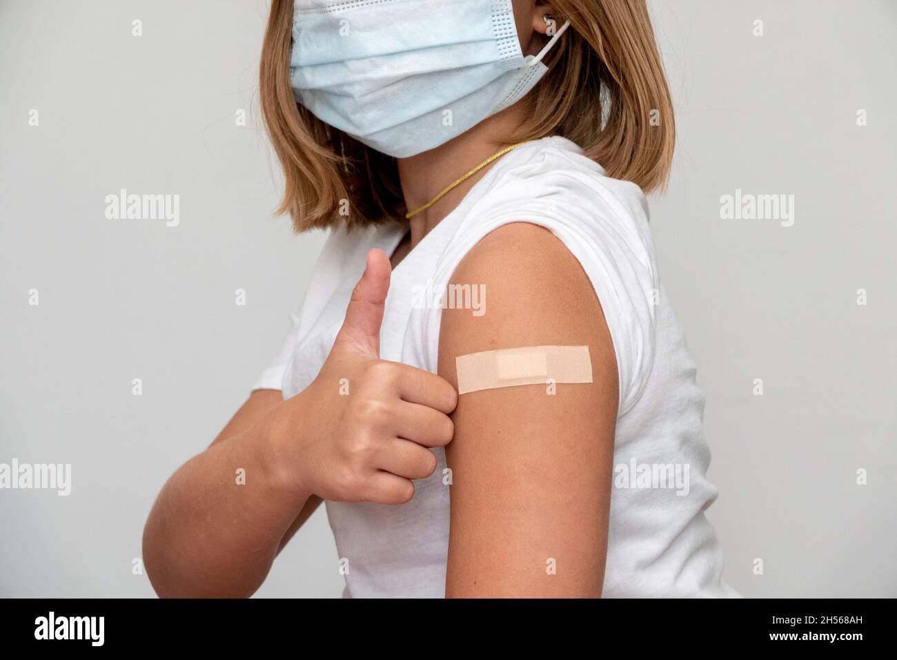 Children receiving vaccine at out side of the thigh.Children vaccine. Stock Photo