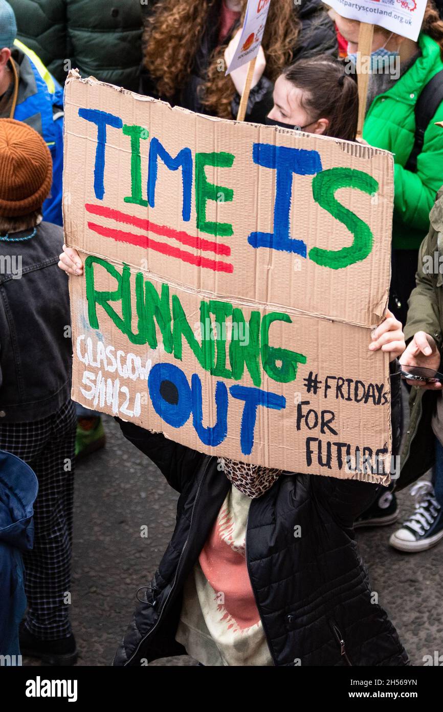 banner at Fridays for Future march in Glasgow on 5 November 2021 during COP26 saying 'Time is Running Out' Stock Photo