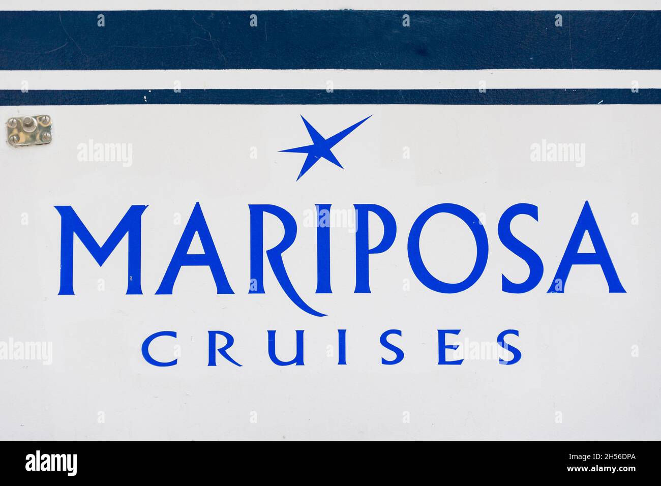 Logo of Mariposa Cruises painted on a ship moored in the waterfront in Toronto city, CanadaNov. 6, 2021 Stock Photo