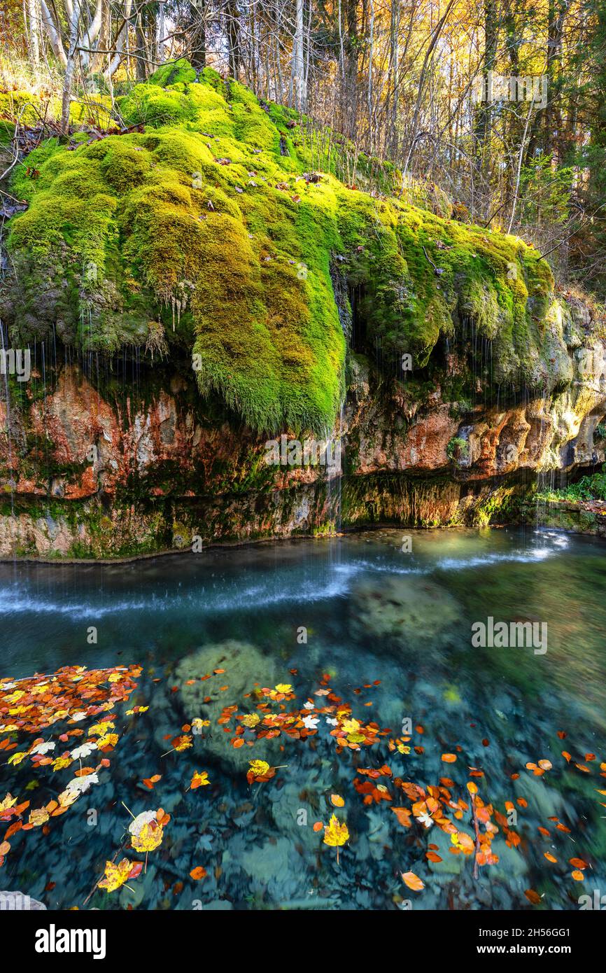 Kallektuffquell waterfall on Mullerthal trail in Luxembourg longexposure crystal clear water autumn fall in November Stock Photo