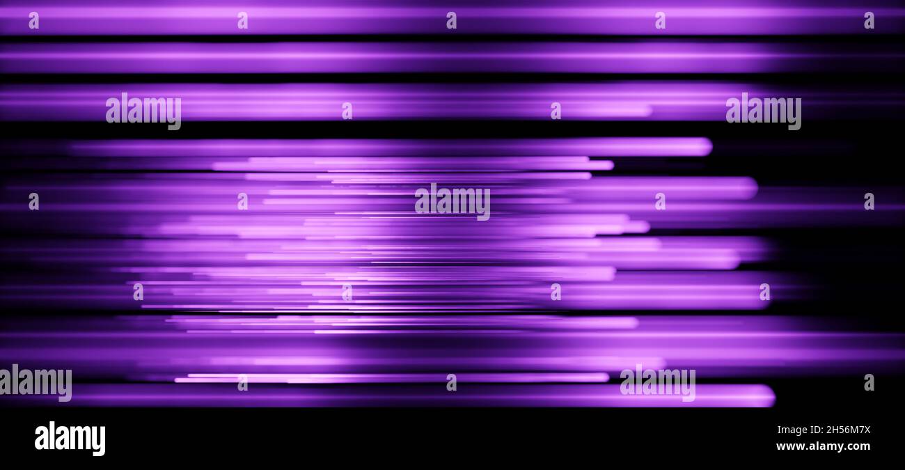 Glowing purple horizontal light streaks or lines with selective focus against black background Stock Photo