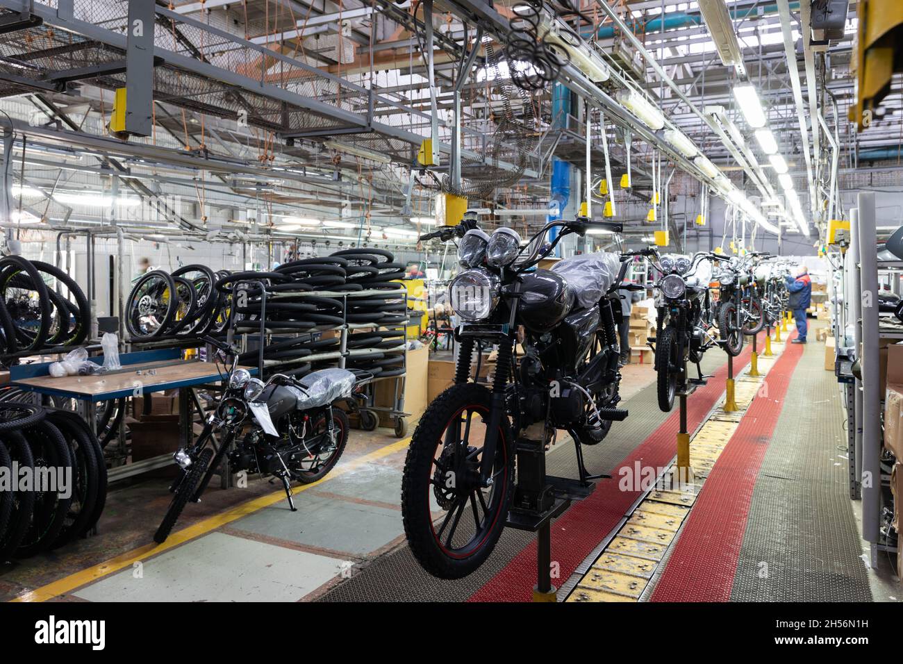 modern motorcycle assembly line of motorcycles and scooters Stock Photo