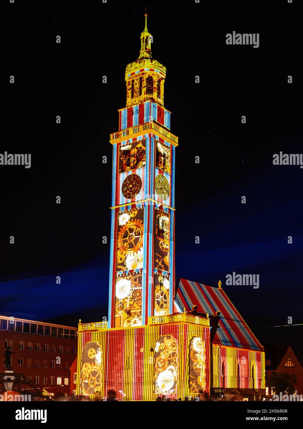 AUGSBURG, GERMANY - OCTOBER 24: Illuminated historic Perlach tower at the festival of lights in Augsburg, Germany on October 24, 2021 Stock Photo