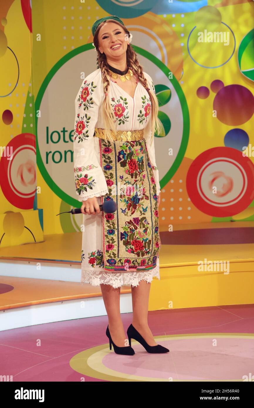 BUCHAREST, ROMANIA - October 31, 2021: Anca Pantaru, the folk singer of traditional Romanian music sings in the TV studio of Lottery. Stock Photo