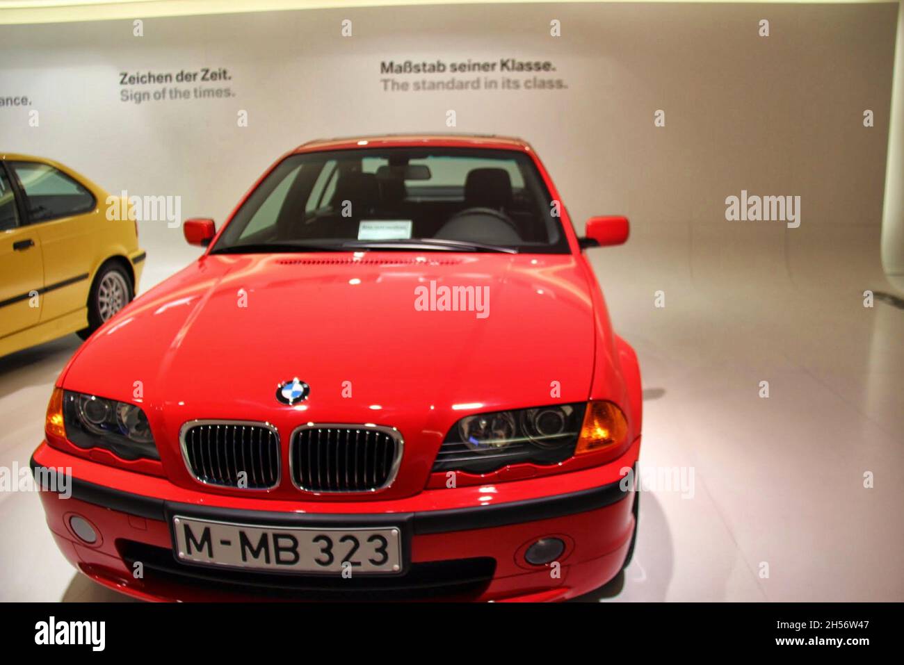 BMW 3 Series (E46): Front view, color red, 4th generation, manufactured from 1998 to 2006. BMW Museum, Munich - Germany - September 2013. Stock Photo