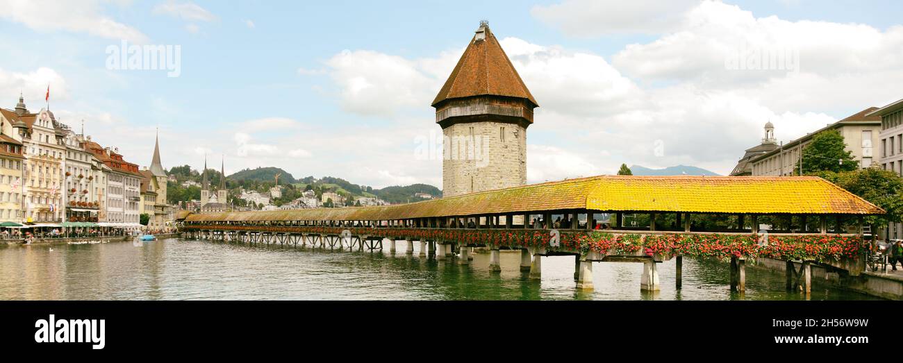 Switzerland Europe Travel panorama landscape banner of Lucerne city, landmark tourist attraction Kapellbrucke Chapel Bridge and Wasserturm water tower Stock Photo