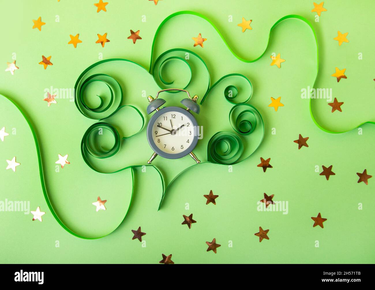 Human brain made from paper and alarm clock in it.COncept of the