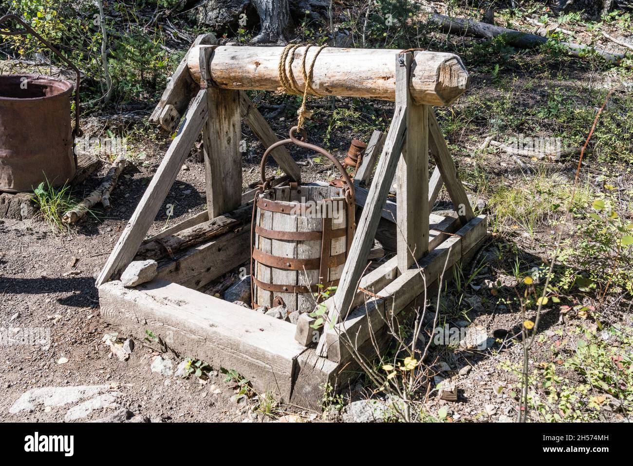 A vertical gold mine shaft and ore bucket in Miner's Park in Bullion