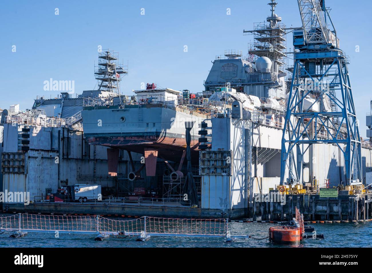 Seattle, WA - USA - Sept. 23, 2021: Horizontal view the USS Cape St. George, a Ticonderoga-class cruiser, undergoing a “long-term” repair and maintena Stock Photo