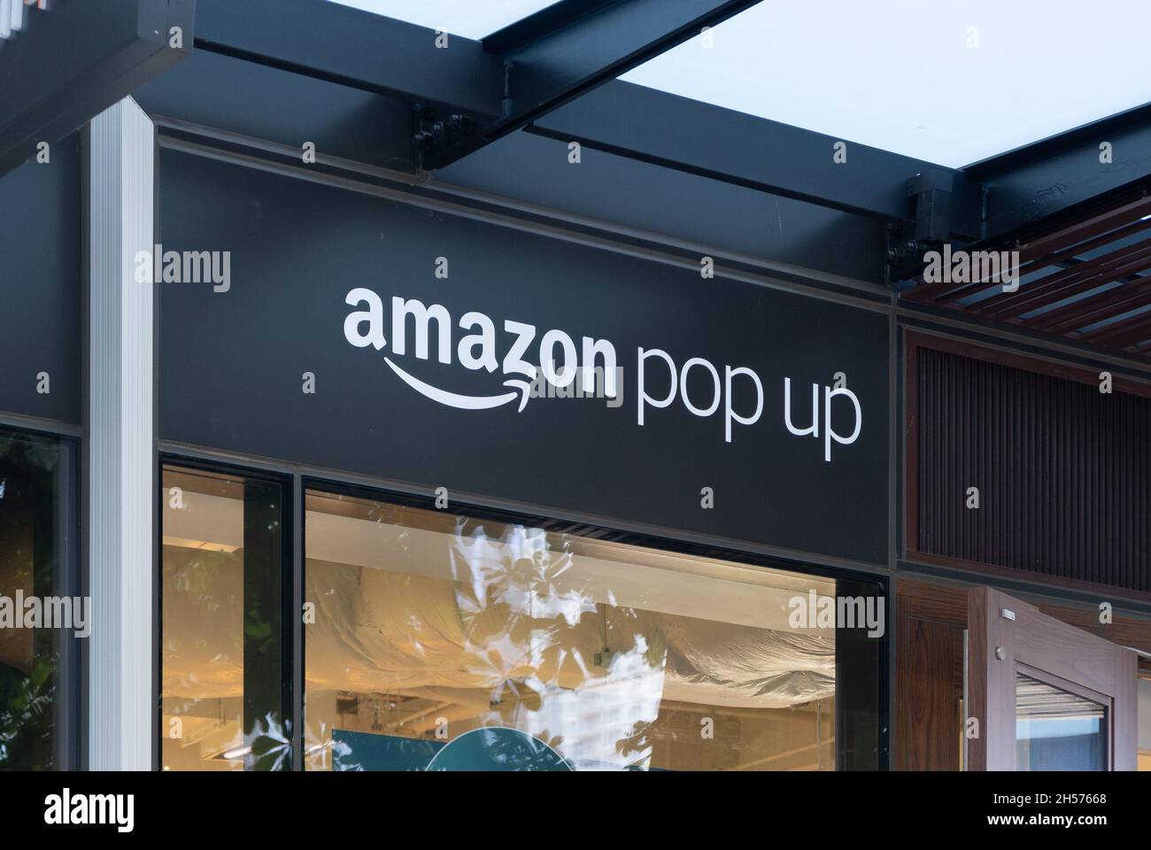 Seattle, WA - USA - Sept. 24, 2021: Horizontal view of Amazon pop up's signage at Amazon's latest brick-and-mortar retail concept. Stock Photo