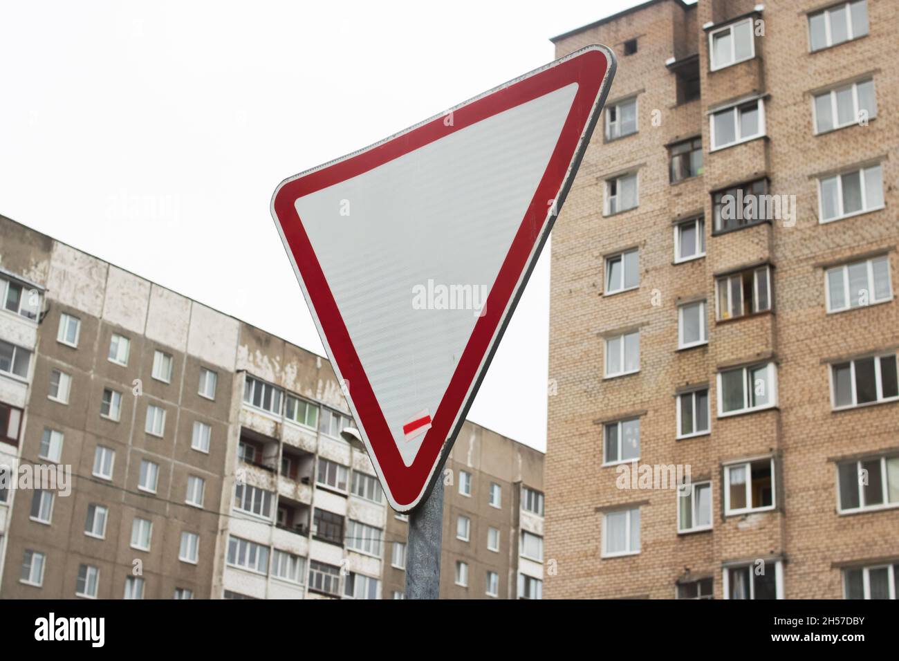 Triangular Large Building Sign Triangular With Red Border And White Background High Resolution Stock ...