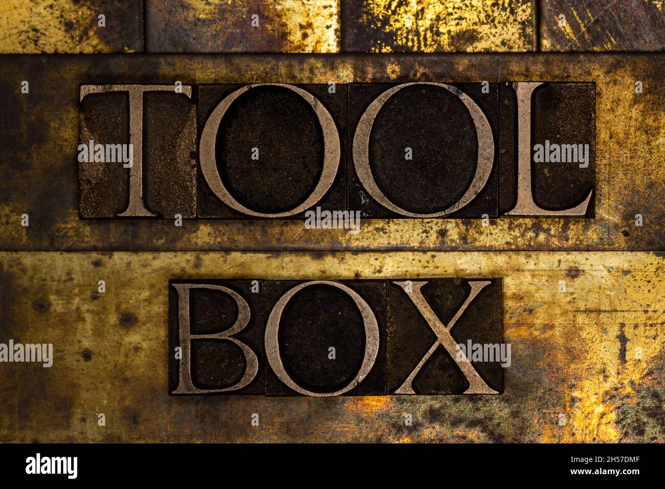 Toolbox text message on textured grunge copper and vintage gold ...