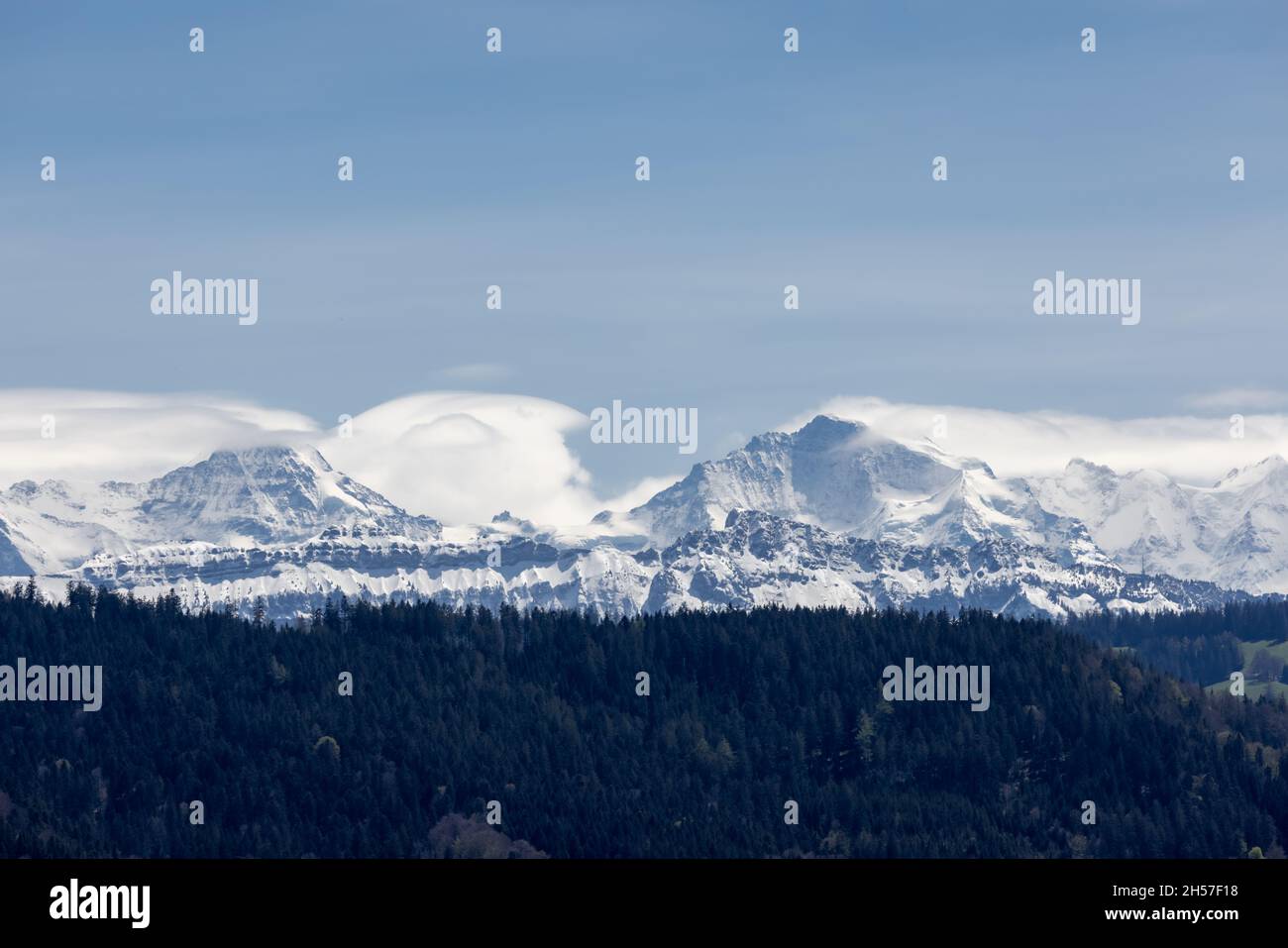 An aerial view of snowy mountains and forests Stock Photo - Alamy