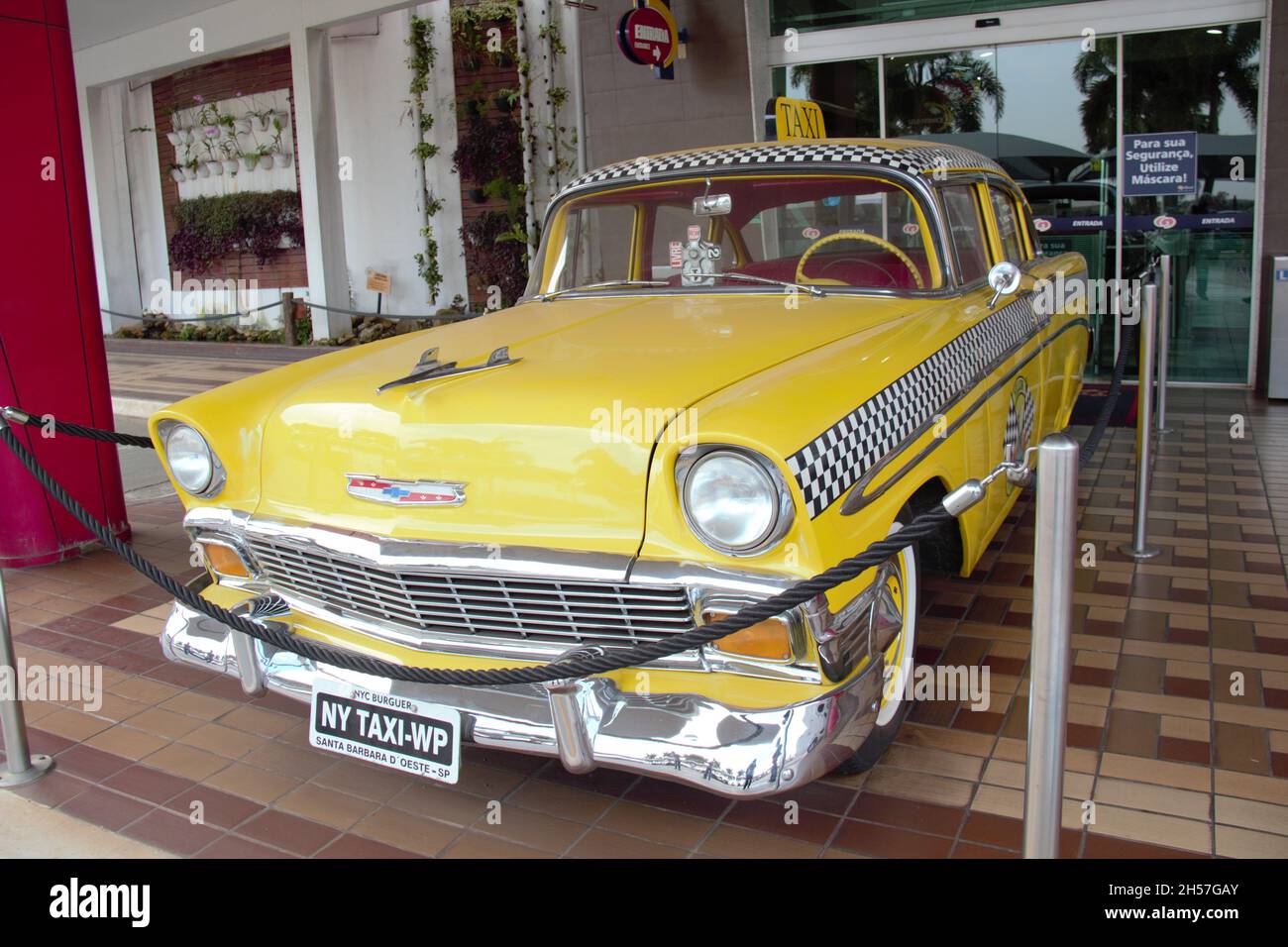 Chevrolet 210: Front closed, sedan, year 1956, yellow color, taxi. In Exposition. Santa Bárbara d'Oeste - São Paulo - Brazil. Stock Photo