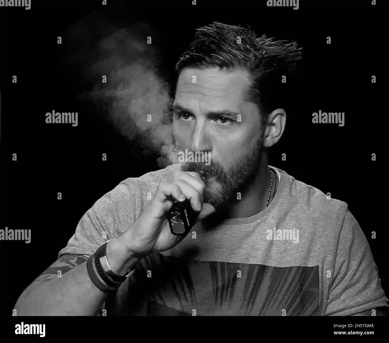 Tom Hardy vaping Stock Photo