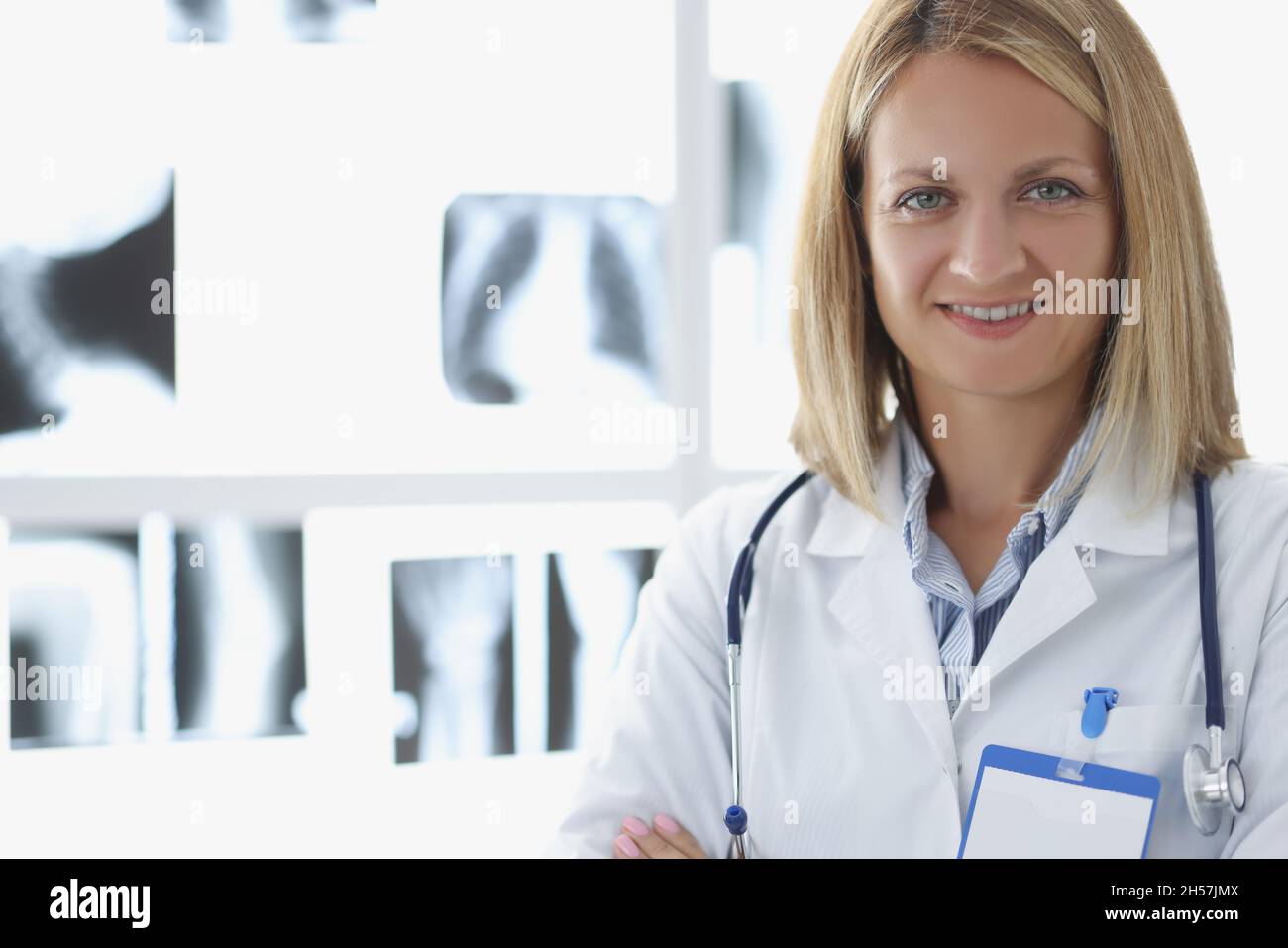 Female wearing stethoscope Stock Photo