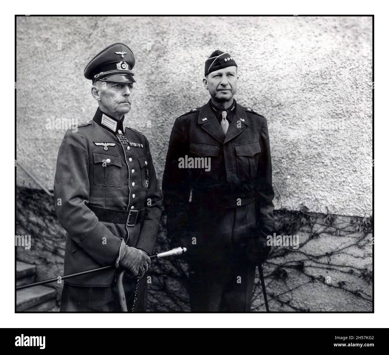American Propaganda WW2 Image of surrendered General Gerd Von Rundstedt a leading military captured Nazi POW with Lieutenant-General Alexander M. Patch, Commanding General of U.S. 7th Army, 5 May 1945 Stock Photo