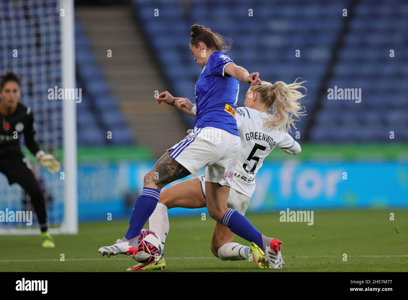 LEICESTER, GBR. 7TH NOV 2021. Alex Greenwood of Manchester City makes a tackle on Natasha Flint of Leicester City during the Barclays FA Women's Super League match between Leicester City and Manchester City at the King Power Stadium, Leicester on Sunday 7th November 2021. (Credit: James Holyoak | MI News) Credit: MI News & Sport /Alamy Live News Stock Photo