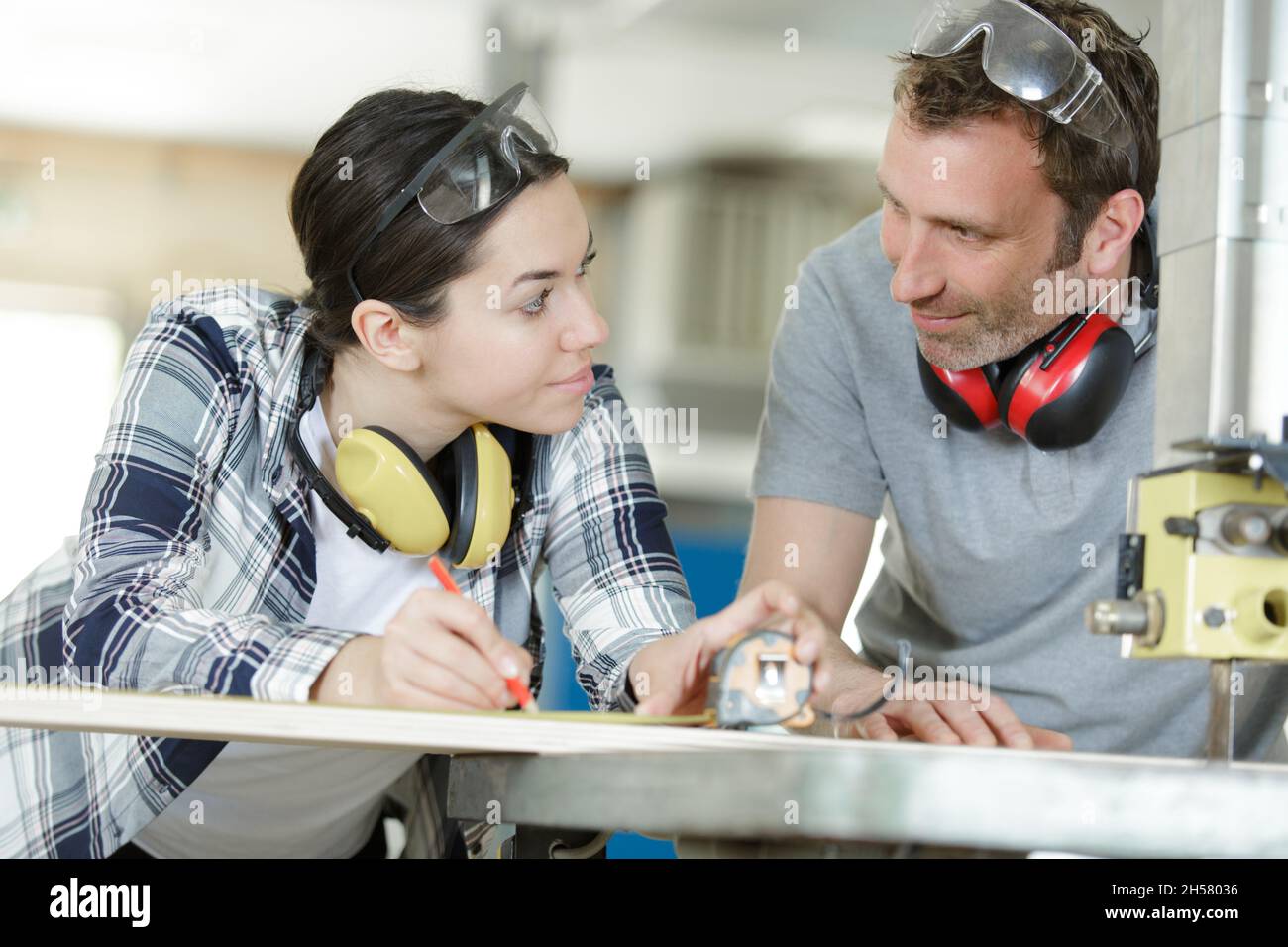 female apprentice during carpentry training program Stock Photo Alamy