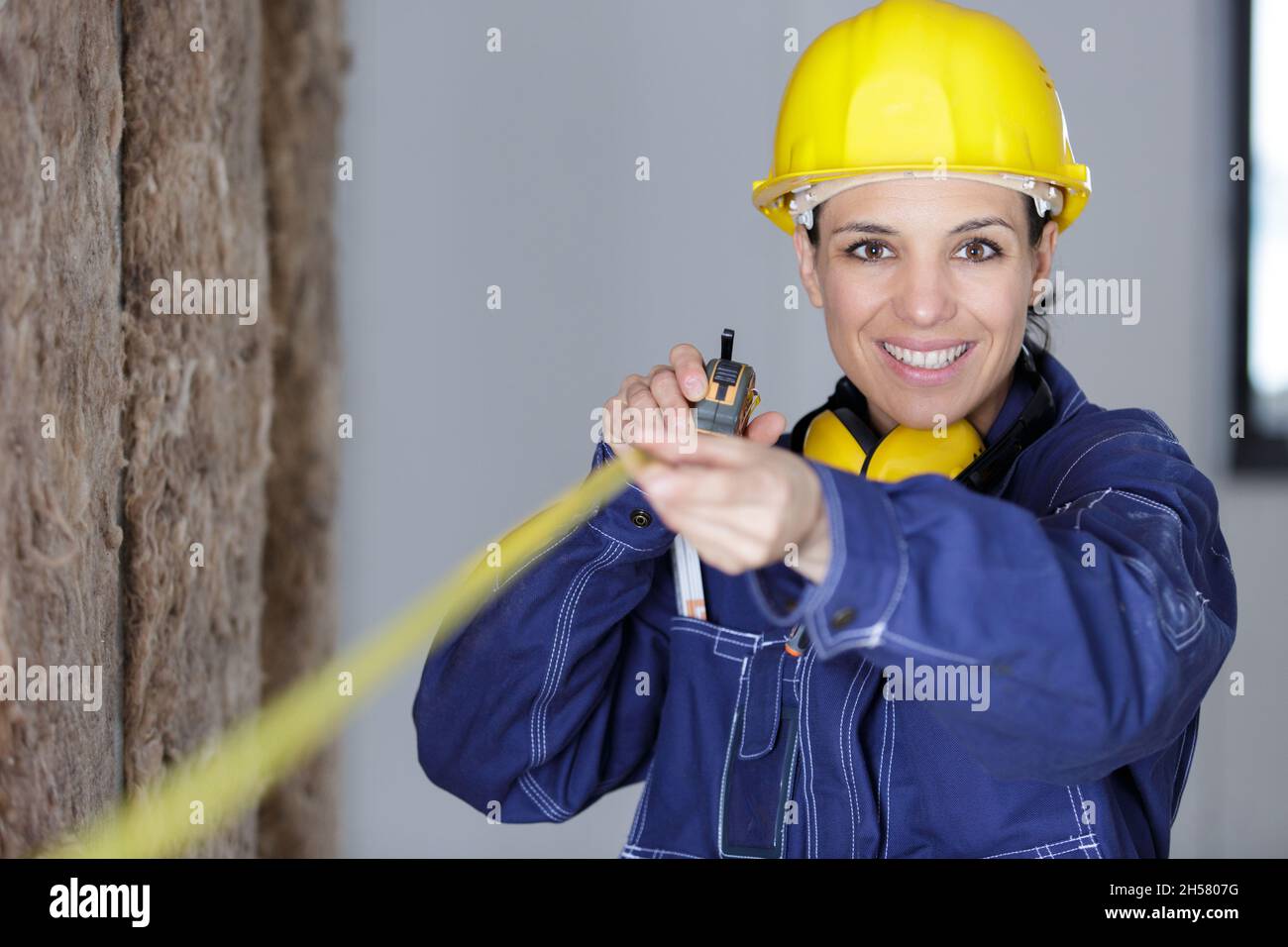 Woman Worker Using Measuring Tape Stock Photo Alamy woman-worker-using-measuring-tape-stock-photo-alamy