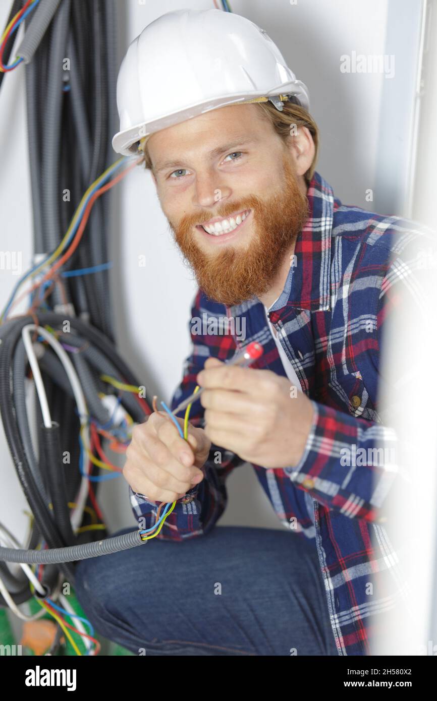 Electrical wires hanging wall hires stock photography and images Alamy