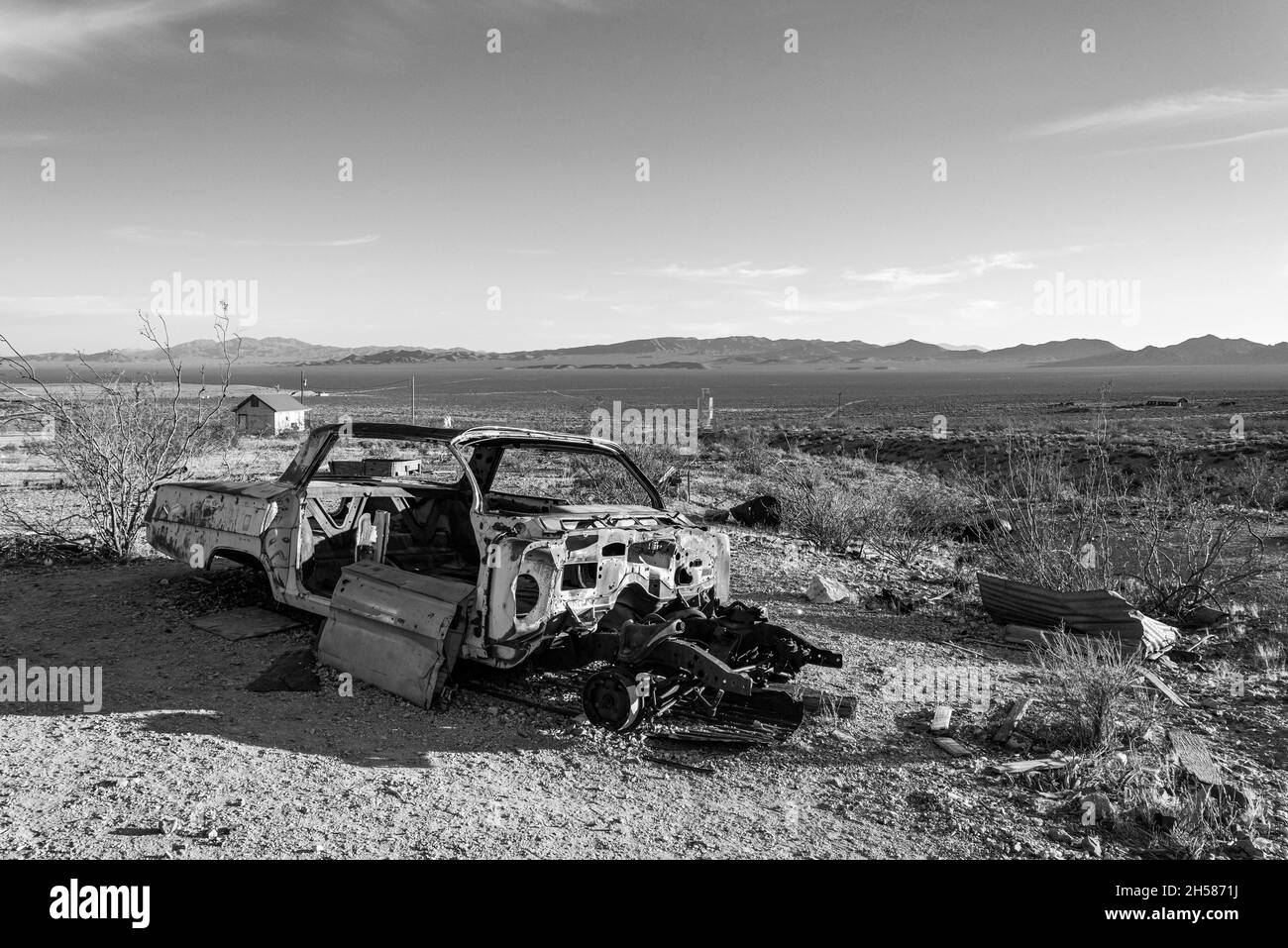Abandoned car wreck in the ghost town Rhyolite in the Death Valley, USA Stock Photo