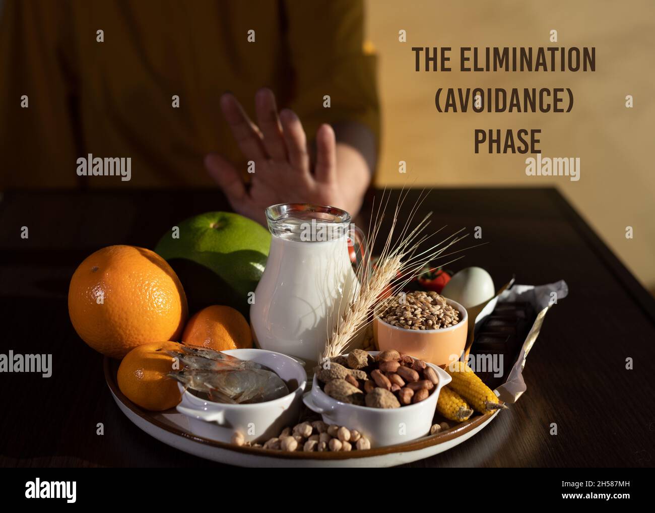 Elimination diet concept. A woman avoids food allergens fish, seafood