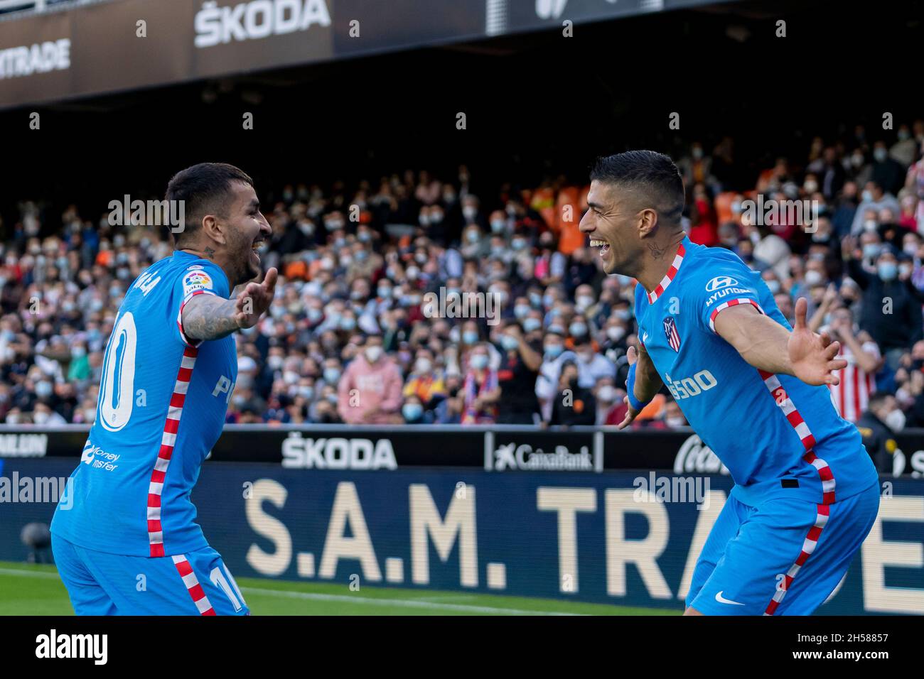 Valencia, Spain. 07th Nov, 2021. Luis Suarez Diaz and Angel Martin Correa Martinez of Atletico de Madrid celebrate after scoring a goal during the Spanish LaLiga football match between Valencia CF and Atletico de Madrid at Mestalla Stadium.Final score; Valencia 3:3 Atletico de Madrid. Credit: SOPA Images Limited/Alamy Live News Stock Photo