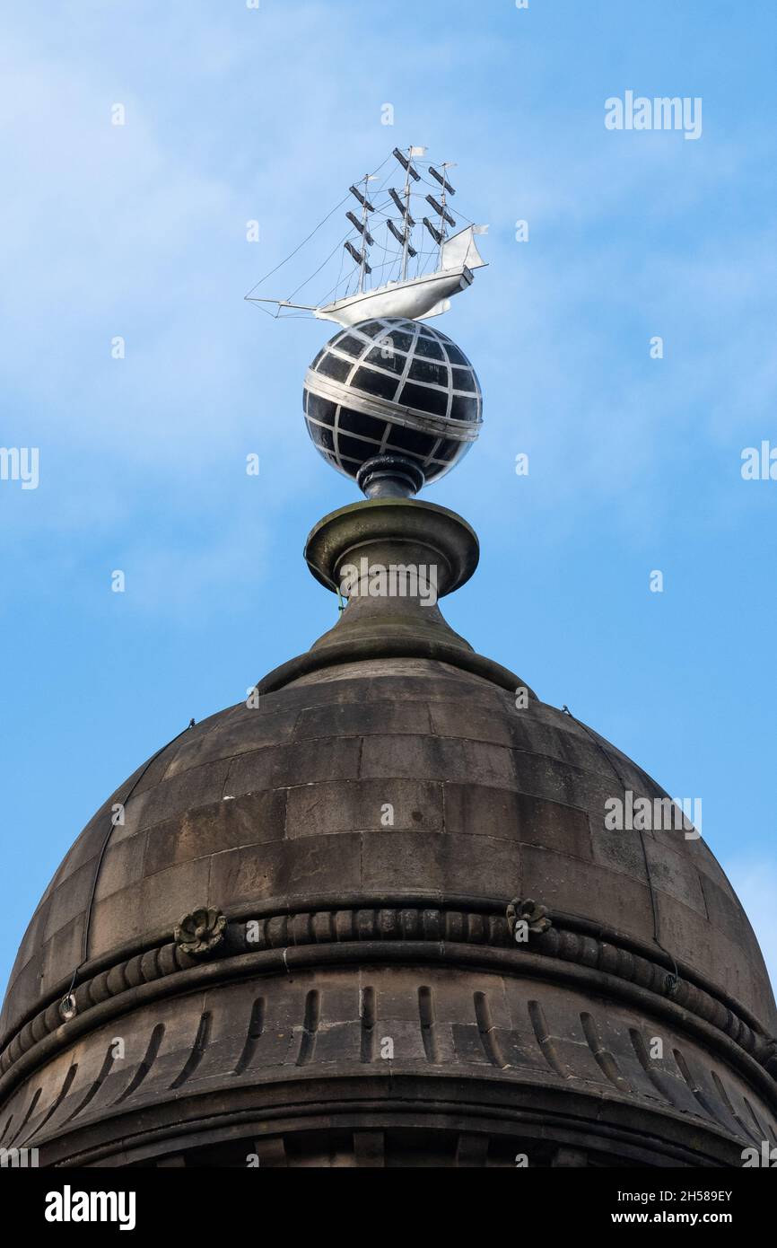 Merchants House of Glasgow, George Square - close up of ship on top of globe on the roof - Glasgow, Scotland, UK Stock Photo