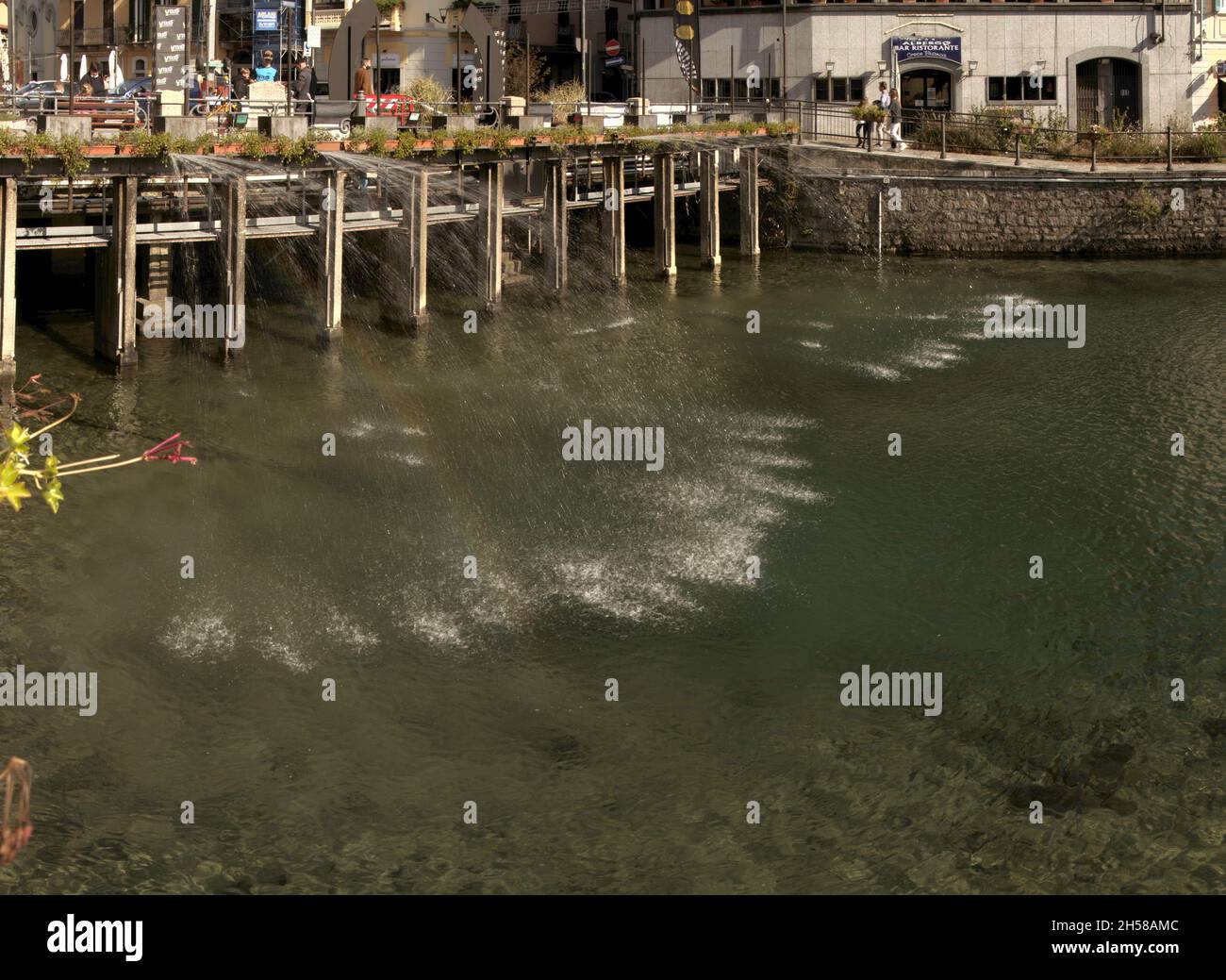 Lakefront at Omegna, Lago d'Orta, showing fountains Stock Photo - Alamy