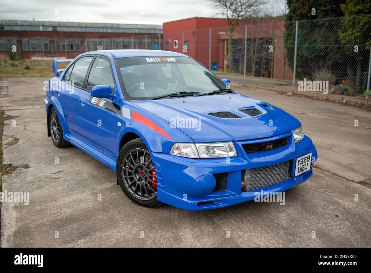 Mitsubishi EVO VI Ralliart GSR parked on a disused industrial site Stock Photo